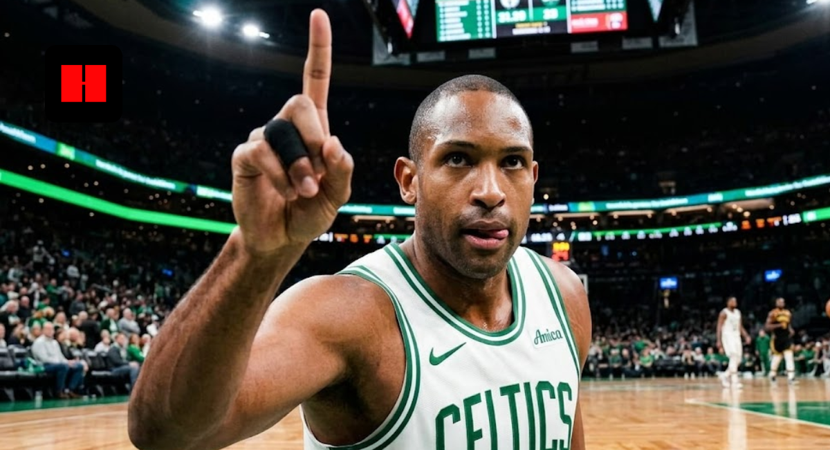 Boston Celtics forward Al Horford pointing his finger up during a game at TD Garden, wearing a white home jersey with green trim.