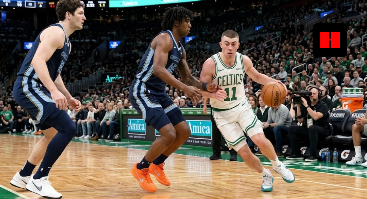 Action shot of a Boston Celtics player in a white home jersey dribbling past a Memphis Grizzlies defender in a blue away jersey at TD Garden.