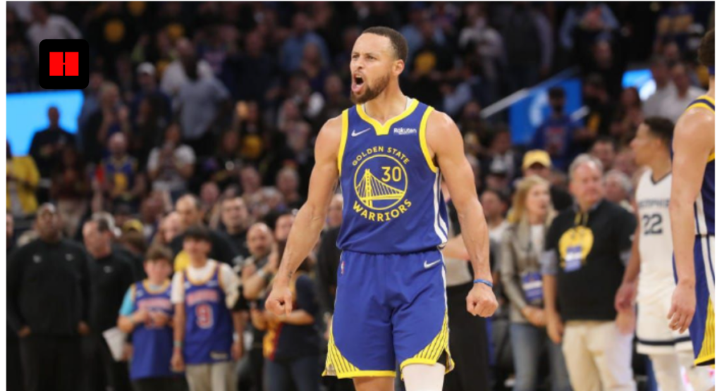 Stephen Curry roaring in Warriors uniform during high intensity NBA game action shot wide banner