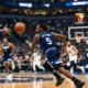 Minnesota Timberwolves fast break with ball movement and transition offense during NBA game