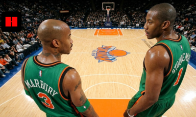 Overhead shot of Stephon Marbury (#3) and Amar'e Stoudemire (#1) facing each other in the rare New York Knicks green St. Patrick's Day uniforms at Madison Square Garden.