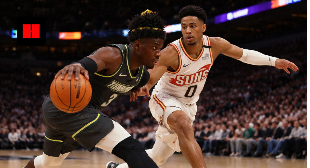 Anthony Edwards drives to the basket for the Minnesota Timberwolves while defended by a Phoenix Suns player during an NBA game.