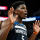 Anthony Edwards of the Minnesota Timberwolves reacting with hands up during a basketball game.