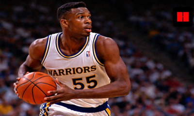 Billy Thompson wearing No. 55 for the Golden State Warriors in 1992 game action