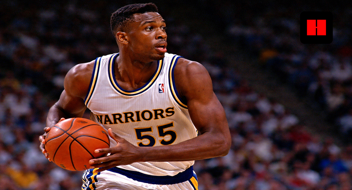 Billy Thompson wearing No. 55 for the Golden State Warriors in 1992 game action