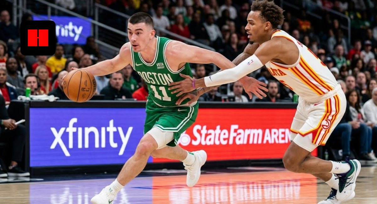 Boston Celtics point guard driving to the basket while being defended by an Atlanta Hawks player during an NBA game.