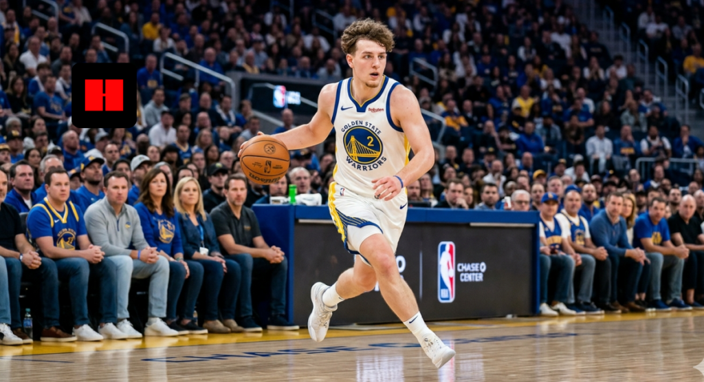 Golden State Warriors guard Brandin Podziemski (#2) dribbling the basketball down the court during a home game at Chase Center in 2026. He is wearing the team's white Association Edition jersey while fans in the background watch from the stands.