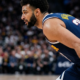 Denver Nuggets guard drives forward during game action after explosive 53-point performance in high-scoring matchup