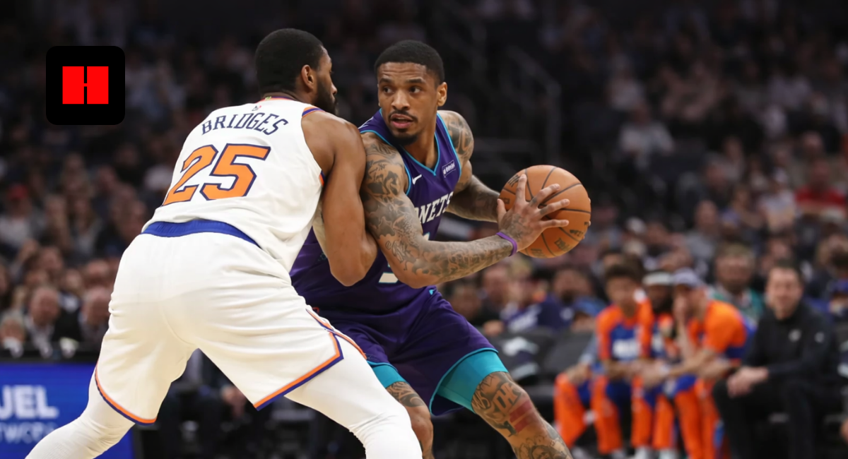 Charlotte Hornets player backing down New York Knicks defender during NBA basketball game action