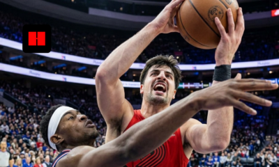 Deni Avdija drives to the rim for a layup over VJ Edgecombe during the Portland Trail Blazers vs Philadelphia 76ers game in Philadelphia on March 15, 2026.