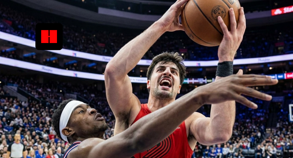 Deni Avdija drives to the rim for a layup over VJ Edgecombe during the Portland Trail Blazers vs Philadelphia 76ers game in Philadelphia on March 15, 2026.