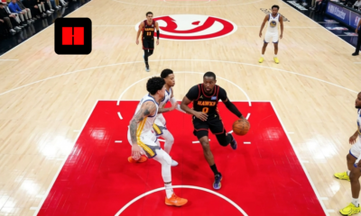 Atlanta Hawks guard drives into the paint against Golden State Warriors defenders during 126-110 win in 2026 matchup