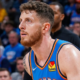 Oklahoma City Thunder center Isaiah Hartenstein looking on during an NBA game in a blue Thunder jersey.