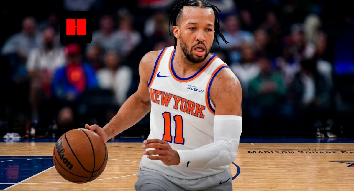 New York Knicks point guard Jalen Brunson (11) bringing the ball up the court at Madison Square Garden, wearing the home white Association Edition jersey with a focused expression during a 2026 regular season game.