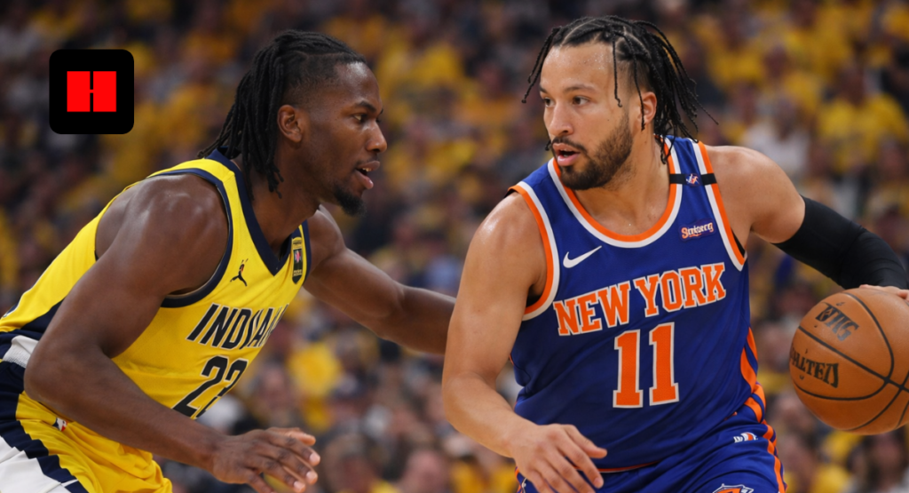 Jalen Brunson of the New York Knicks dribbles against Aaron Nesmith of the Indiana Pacers during an NBA game.