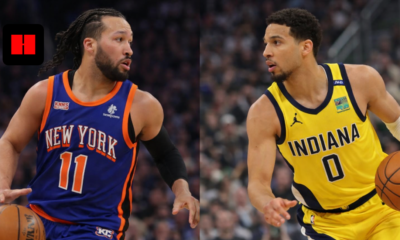 Jalen Brunson of the New York Knicks dribbles while facing Jarace Walker of the Indiana Pacers during an NBA matchup.