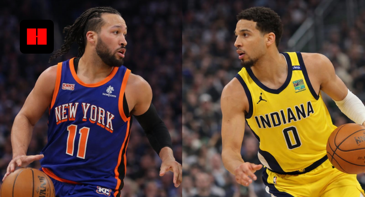 Jalen Brunson of the New York Knicks dribbles while facing Jarace Walker of the Indiana Pacers during an NBA matchup.