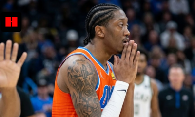 Jalen Williams of the Oklahoma City Thunder on the basketball court, viewed from a side profile with hands held to his face in an intense, prayer-like pose during a game.