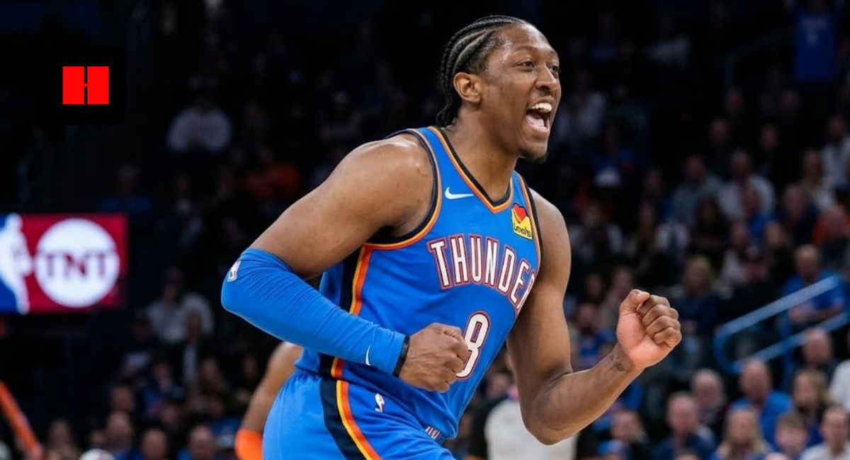 Oklahoma City Thunder forward Jalen Williams celebrating on the court in a blue home jersey during an NBA game.