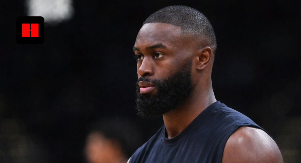 Close-up side profile of Boston Celtics player Jaylen Brown during basketball training session showing focused expression and athletic build.