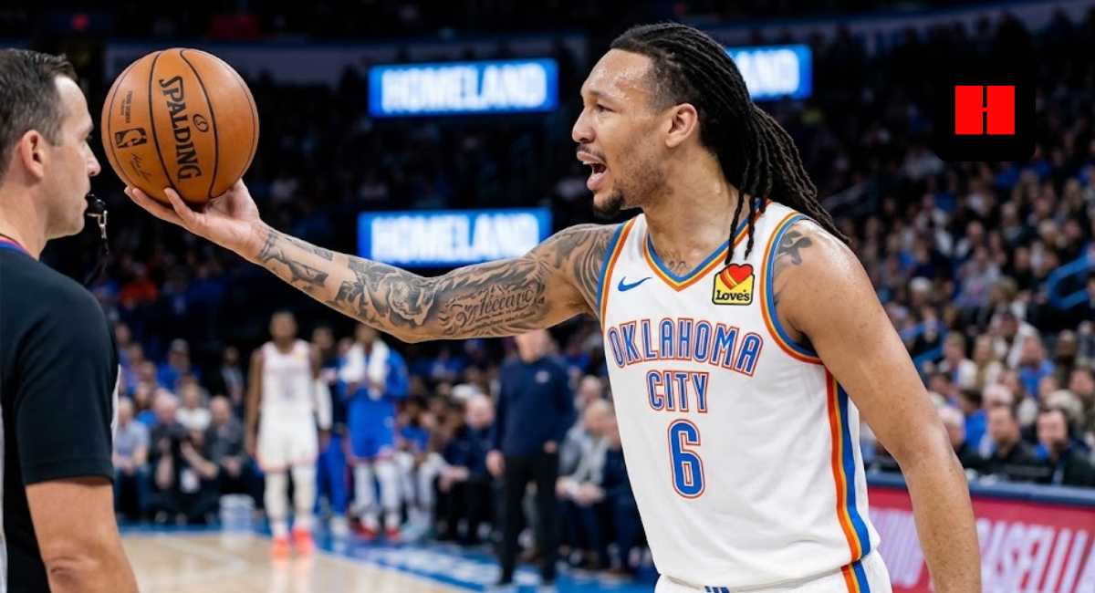 Oklahoma City Thunder player Jaylin Williams wearing a white number 6 jersey, holding a basketball toward a referee during an NBA game.