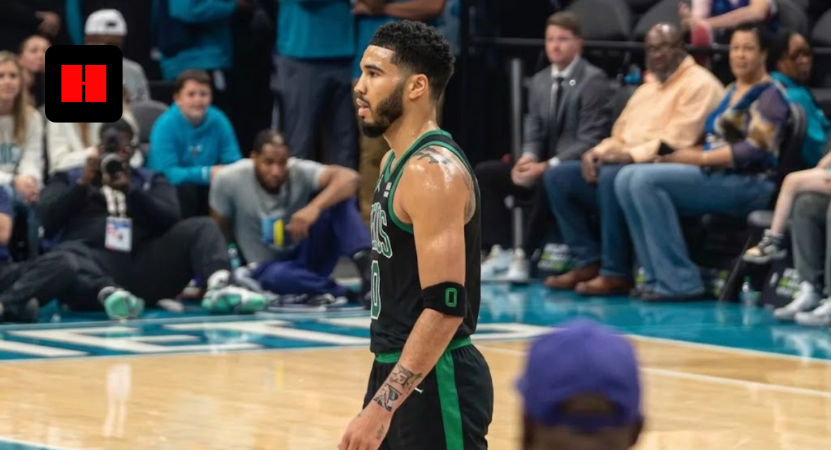 Jayson Tatum in Boston Celtics black and green jersey on court