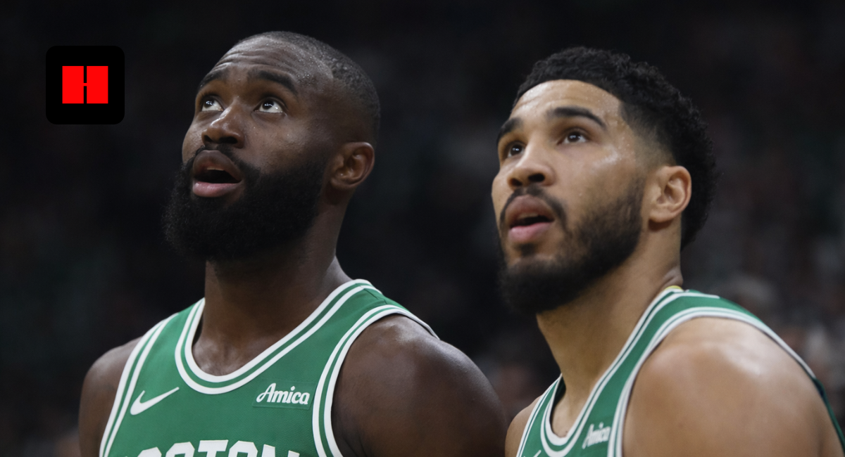 Jayson Tatum and Jaylen Brown of the Boston Celtics looking up during a game at TD Garden.