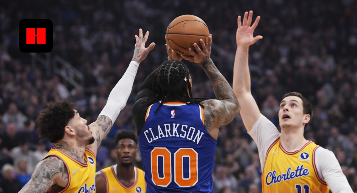 Jordan Clarkson taking a contested shot against Charlotte Hornets defenders during New York Knicks NBA game