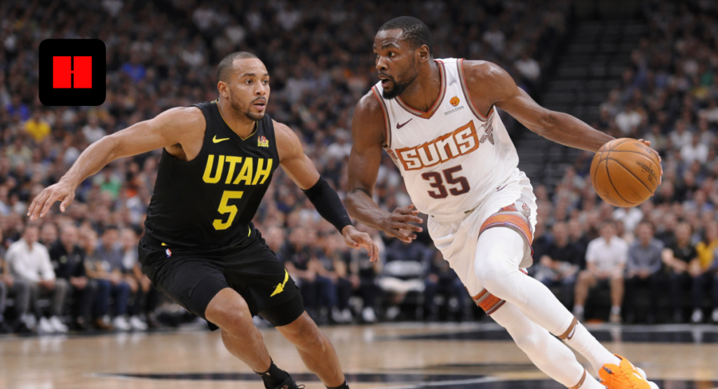 Kevin Durant dribbling past Utah Jazz defender during Phoenix Suns NBA game