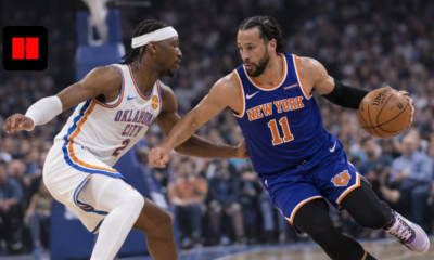 New York Knicks player driving to the basket against Oklahoma City Thunder defender during NBA game