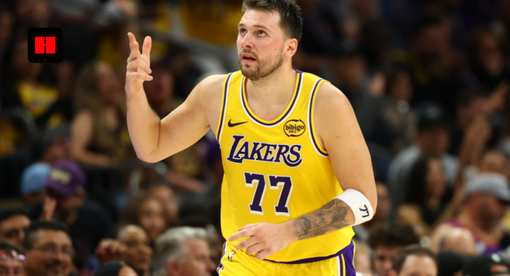 lakers player 77 hand signal nba game.jpg