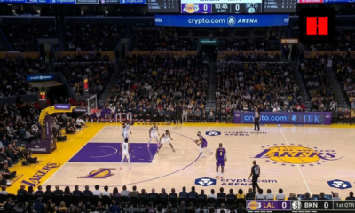 Wide shot of Lakers vs Nets game at Crypto.com Arena with Los Angeles on offense and Brooklyn set on defense during first quarter action.