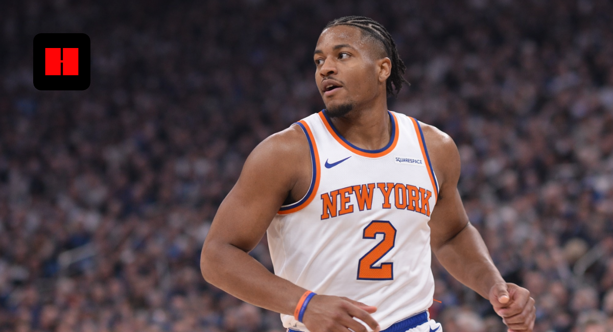 Miles McBride in a white New York Knicks jersey during an NBA basketball game