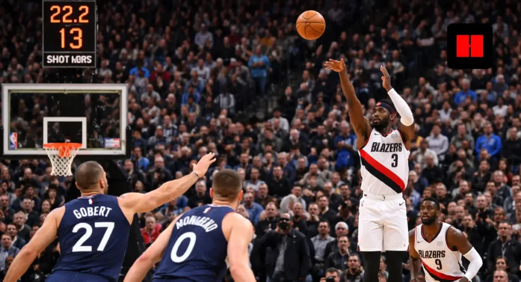 Jerami Grant rises in the right corner and releases a clutch three-pointer over Rudy Gobert and Donte DiVincenzo as the game clock shows 22.2 seconds left
