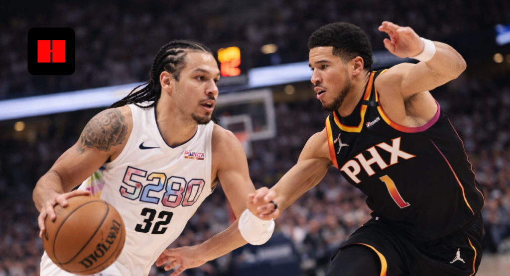 NBA player dribbling and driving to the basket while Phoenix Suns defender closely guards during a professional basketball game