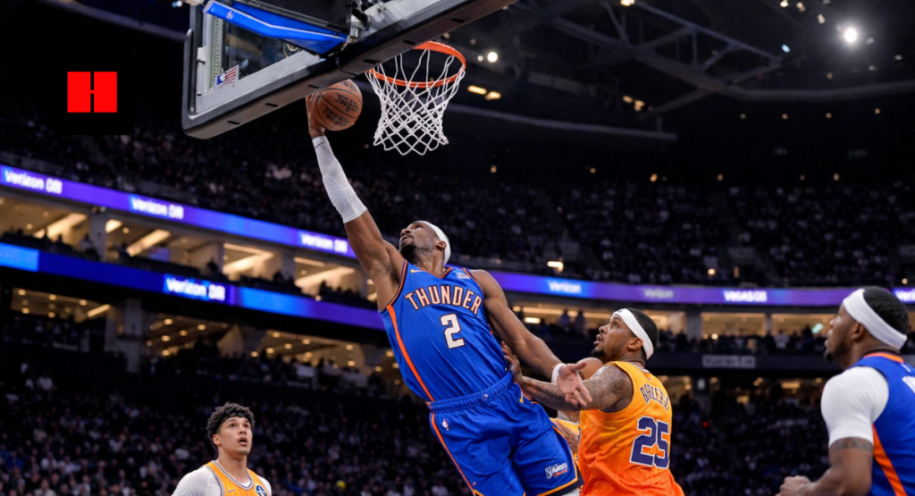 NBA player attempting a layup during a professional basketball game inside a packed arena