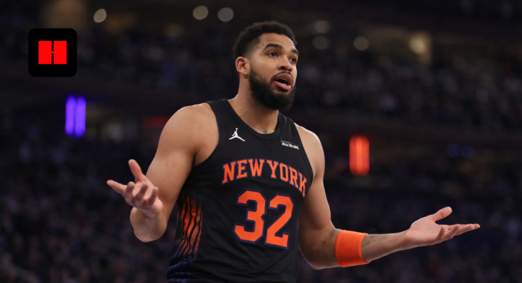 New York Knicks player reacting with hand gesture during NBA basketball game on court