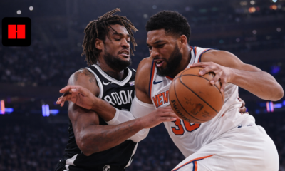 New York Knicks player driving past Brooklyn Nets defender during NBA game action in UHD quality