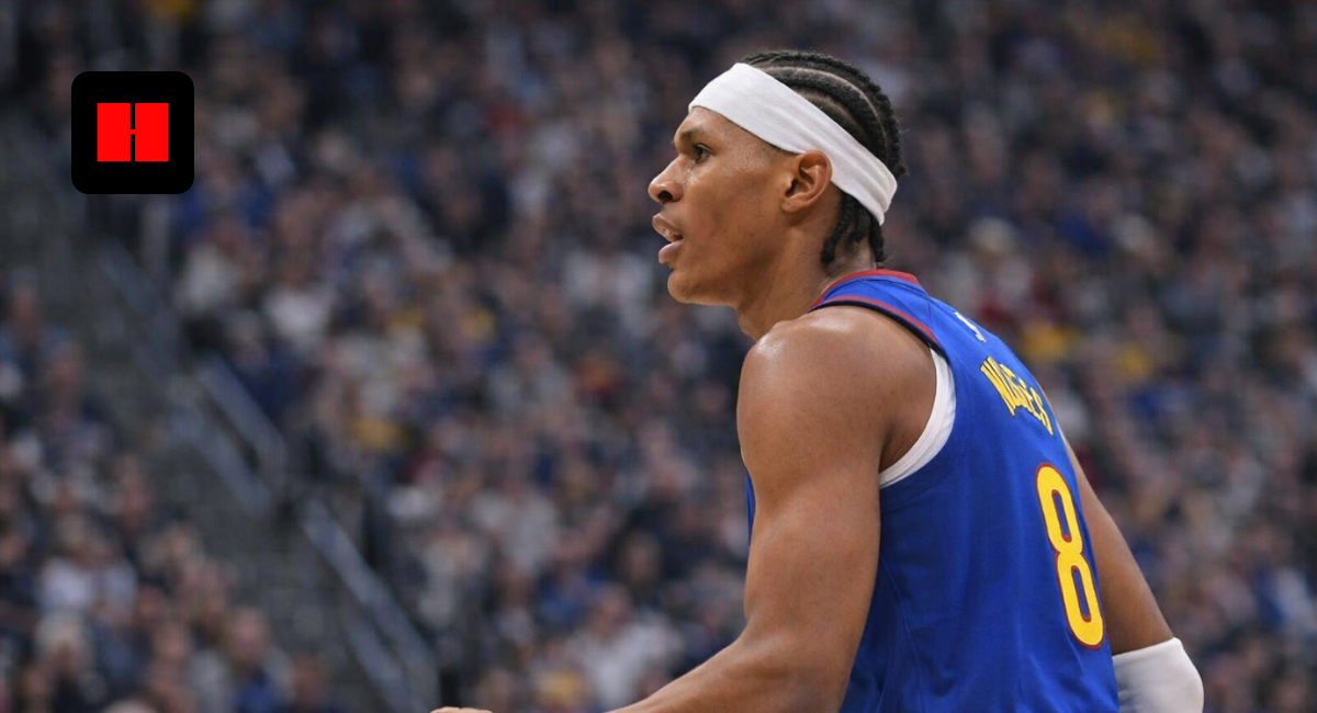 New York basketball player driving with the ball while defended by New Orleans Pelicans player during an NBA game