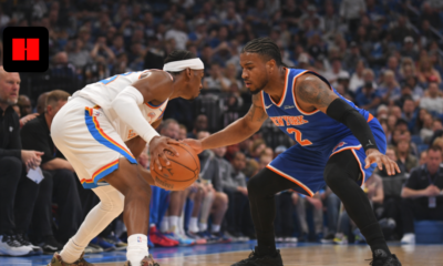 Oklahoma City Thunder player dribbling against New York Knicks defender during an NBA basketball game