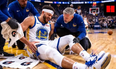 Seth Curry reacts in pain during Golden State Warriors game after suffering adductor soreness against the Minnesota Timberwolves.