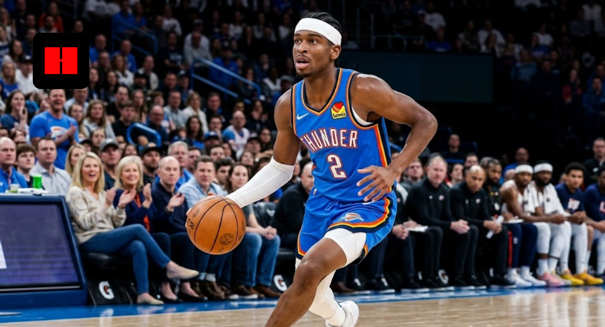 Shai Gilgeous-Alexander in a blue Oklahoma City Thunder jersey dribbling a basketball during an NBA game.