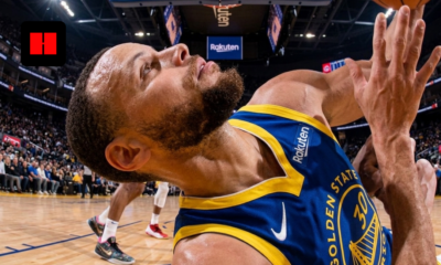 Stephen Curry reacting on court during a Golden State Warriors game, close-up angle highlighting knee injury concern and game intensity in 2026 season