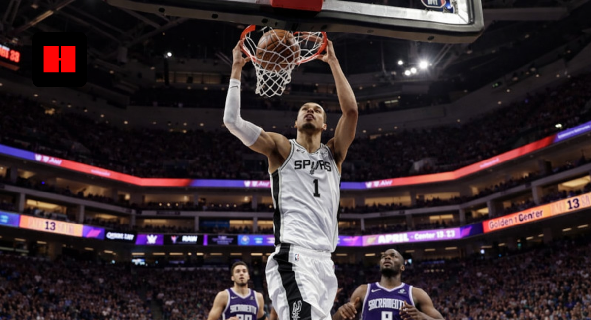 Victor Wembanyama dunking for San Antonio Spurs against Sacramento Kings at Golden 1 Center during NBA game.