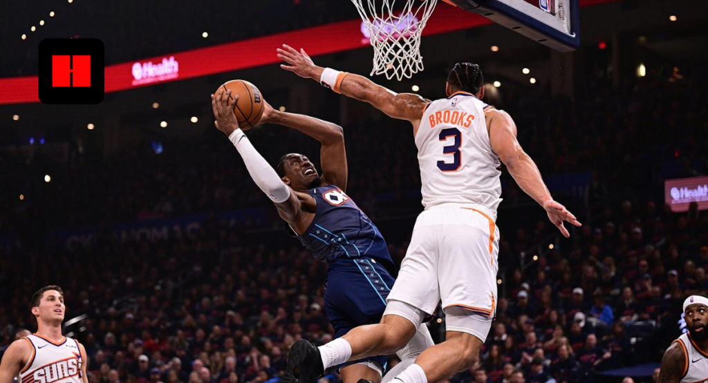 Oklahoma City Thunder forward Jalen Williams (J-Dub) driving for a contested layup against Phoenix Suns defender Grayson Brooks during an NBA playoff game at Paycom Center.