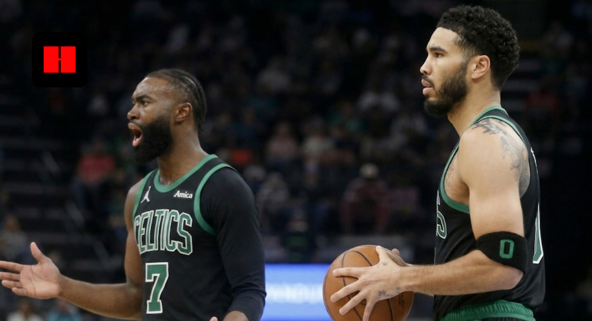 Jaylen Brown shouting and Jayson Tatum holding a basketball during a Boston Celtics game, side view.