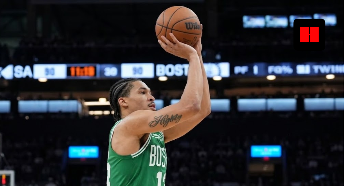 Drew Peterson of the Boston Celtics wearing jersey number 13 while taking a jump shot during an NBA game.