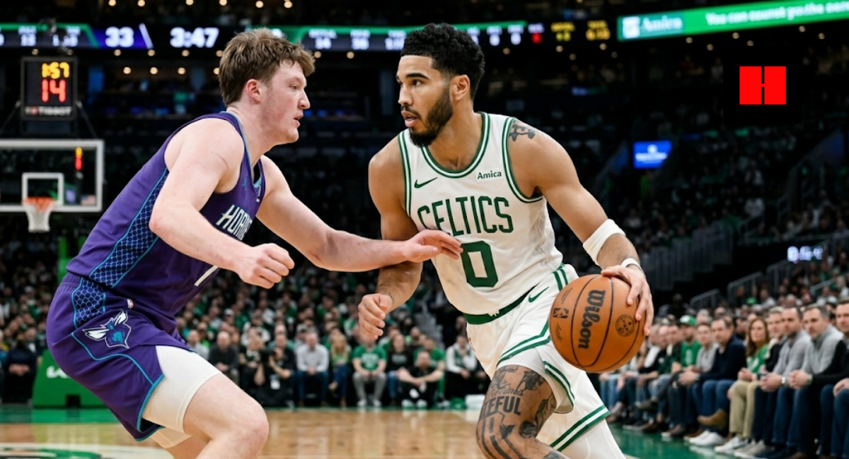 Jayson Tatum of the Boston Celtics drives to the basket while being defended by Grant Williams of the Charlotte Hornets during an NBA game.