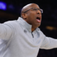 Mike Brown reacting on the sideline during a Sacramento Kings NBA game