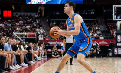 Oklahoma City Thunder guard Nikola Topić holding a basketball in a triple-threat stance during an NBA Summer League game.